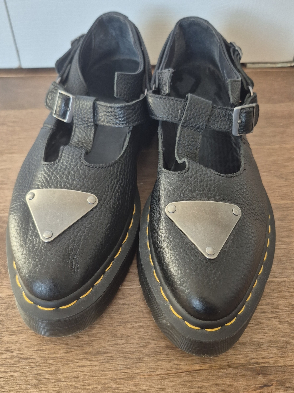 Dr. Martens Black Leather T‑Strap Platform Shoes with Silver Toe Plate